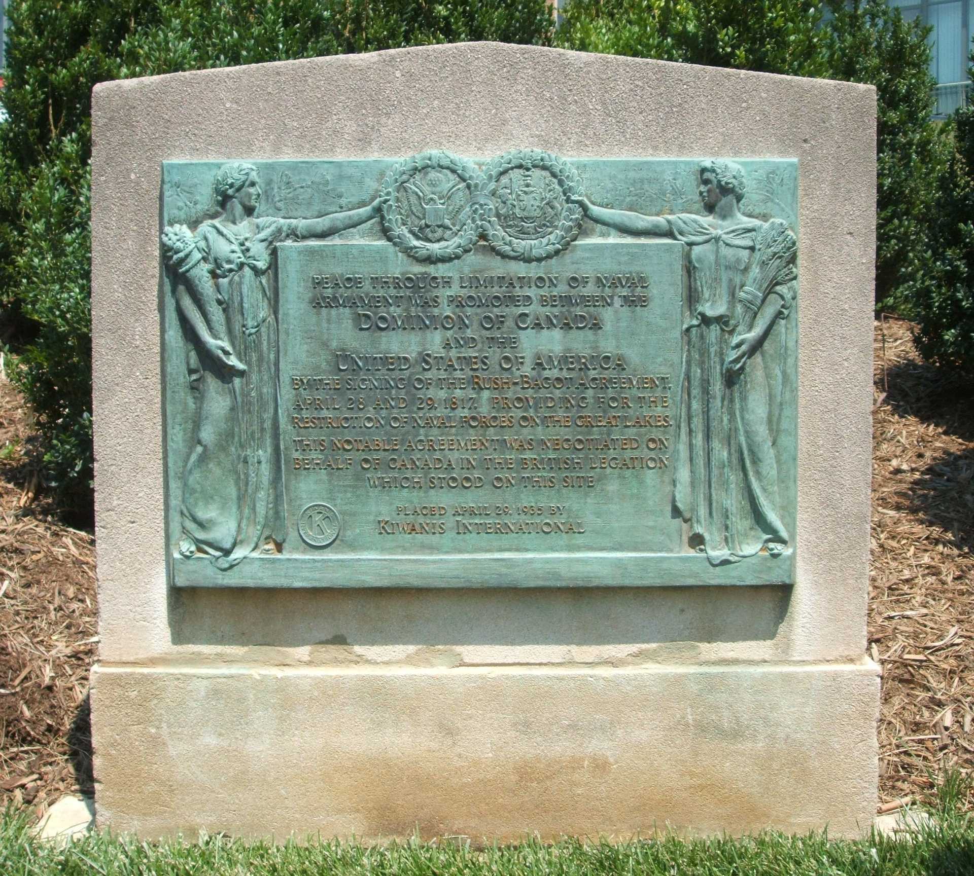 The historical marker set up to commemorate the Rush-Bagot Treaty reads: Peace through limitation of naval armament was promoted between the Dominion of Canada and the United States of America by the signing of the Rush-Bagot Agreement, April 28 and 29, 1817. Providing for the restriction of naval forces on the Great Lakes. This notable agreement was negotiated on behalf of Canada in the British Legation which stood on this site.